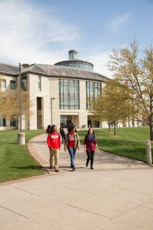 students walking outside library