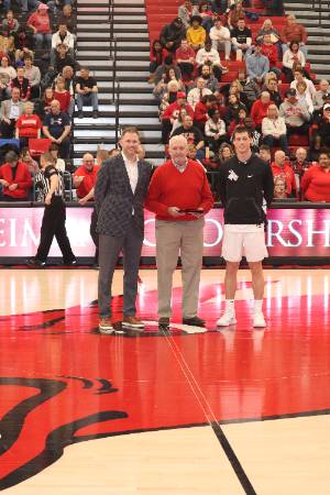 Basketball scholarship presentation on court